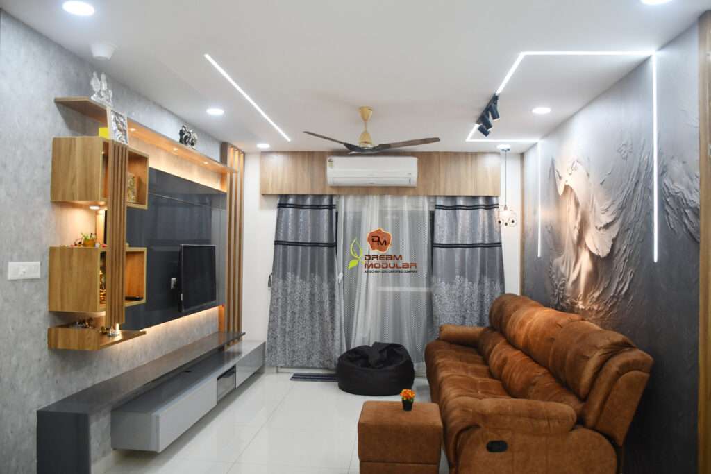 Living room with TV Unit, False Ceiling, Partition, 3D Wallpaper, Cabinets -My Home Mangala - Kondapur - Dream Modular